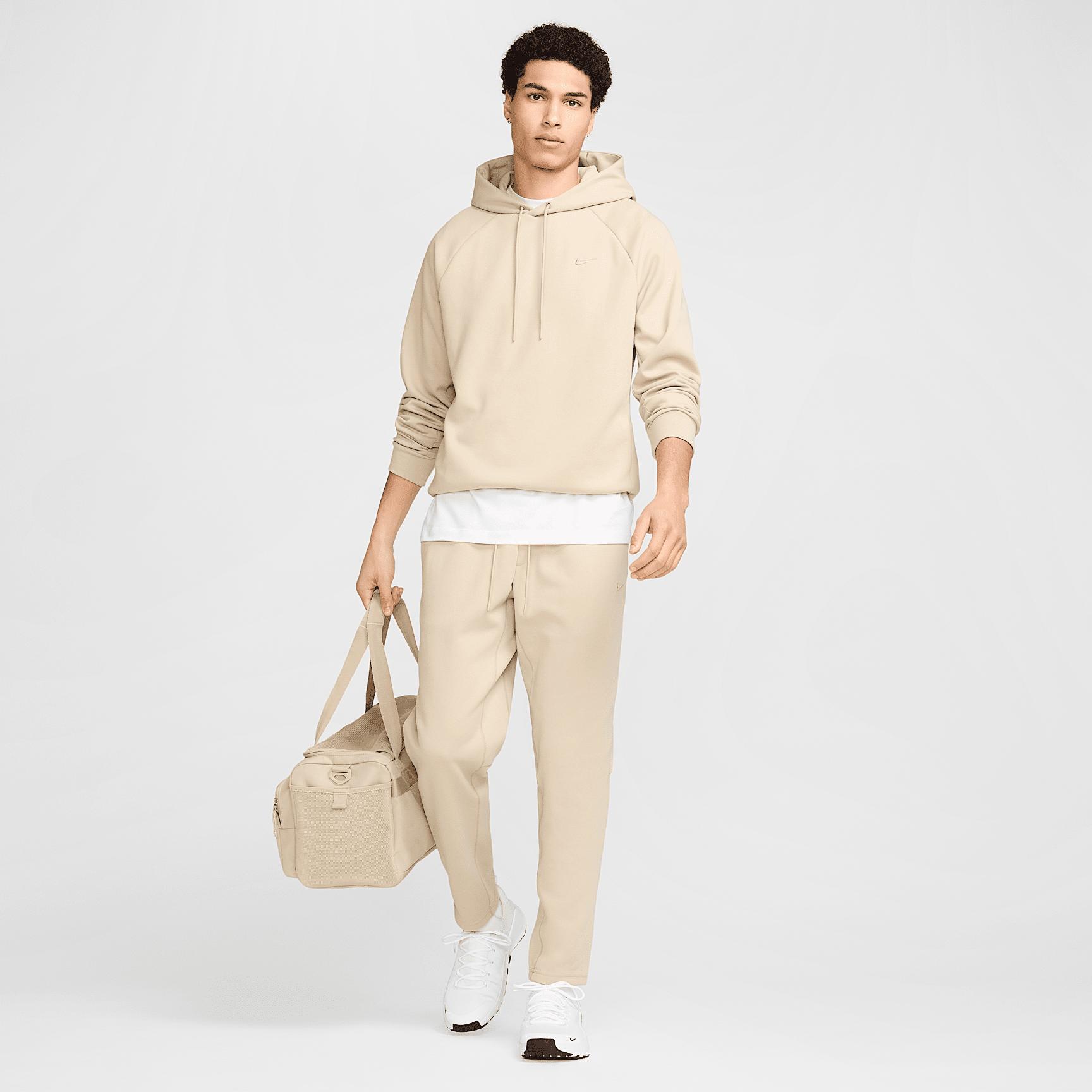 Nike Men's Primary Fleece Dri-FIT UV Tapered Performance Pants Product Image