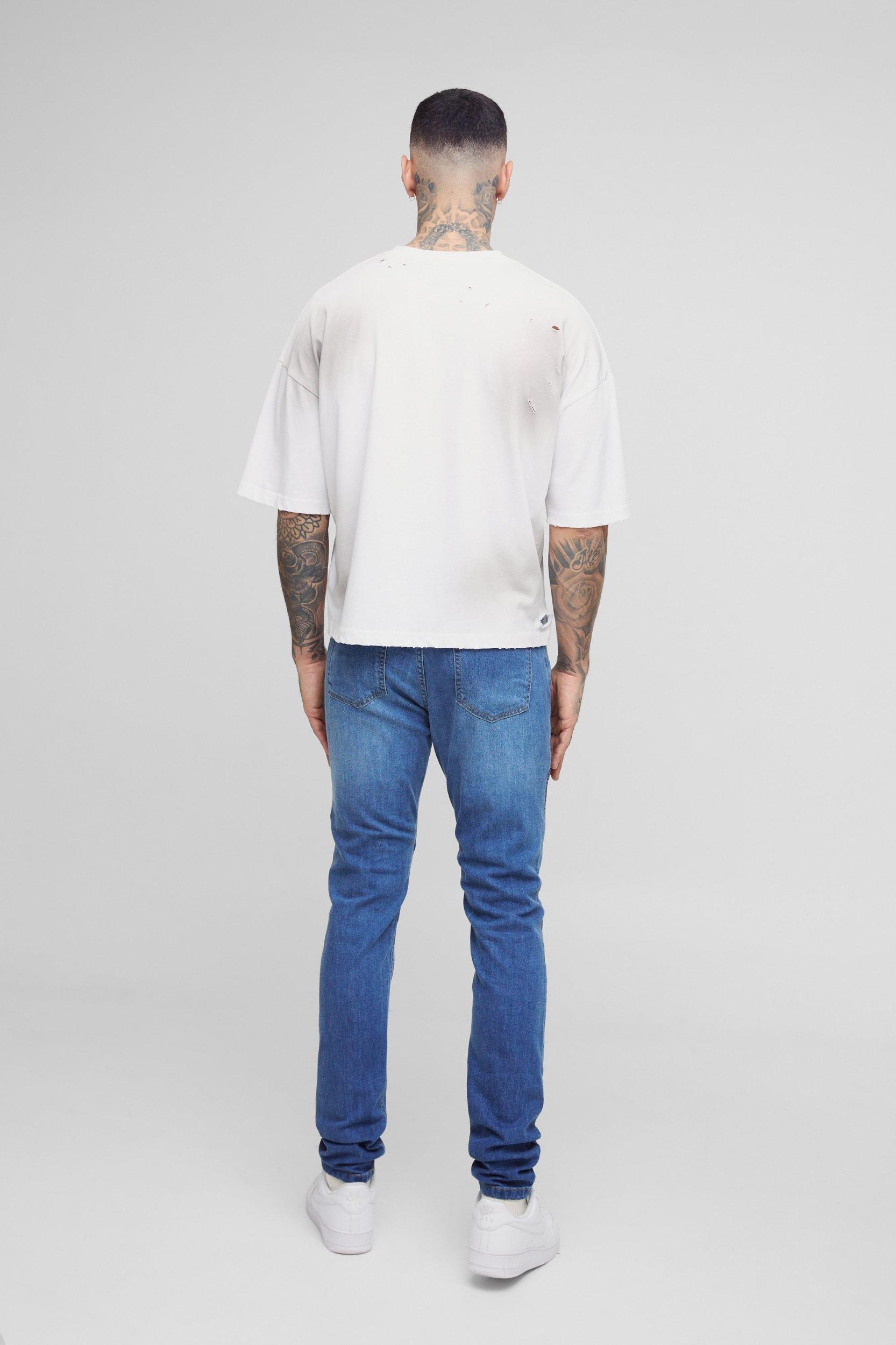 Tall Skinny Biker Ripped Knee Jeans | boohooMAN USA Product Image