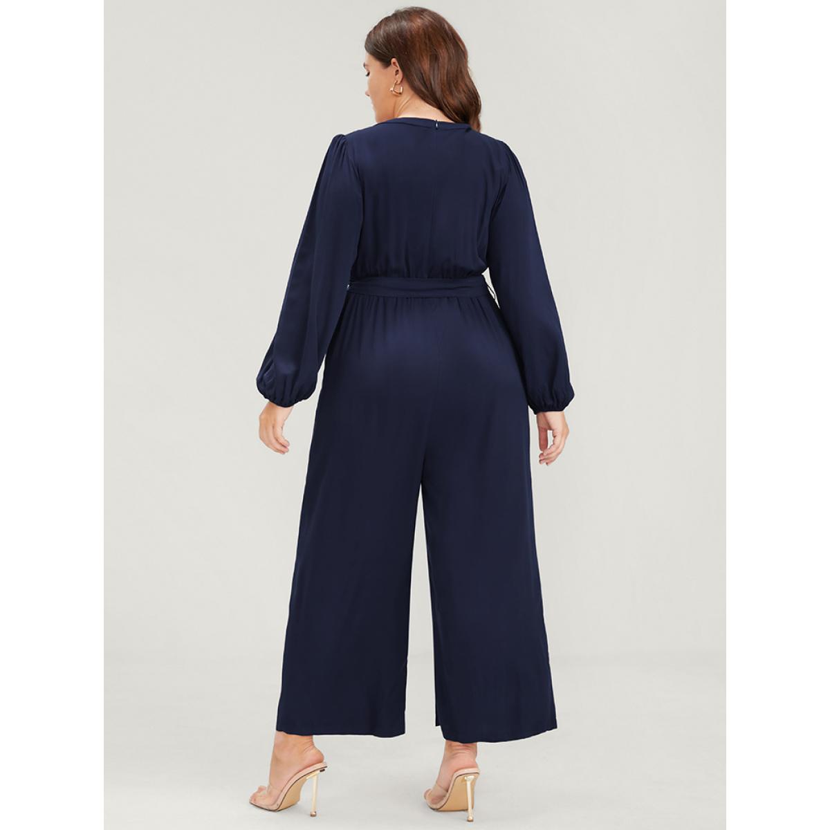 Plus Size DarkBlue Solid V Neck Lantern Sleeve Embroidered Pocket Ties Jumpsuit Women Elegant Long Sleeve V-neck Dailywear Loose Jumpsuits BloomChic 10/M Product Image