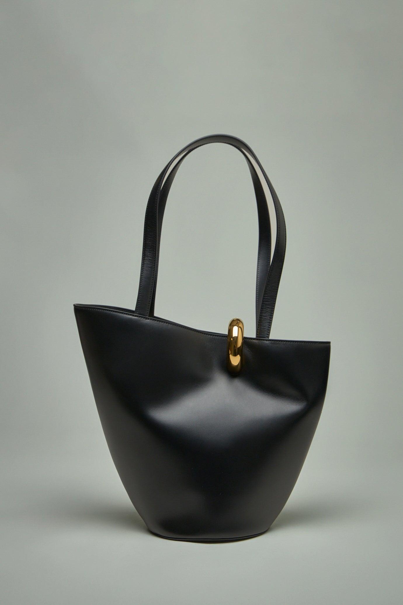JACQUEMUS The Medium Bambola Asymmetric Leather Bucket Bag In Black 990 Product Image