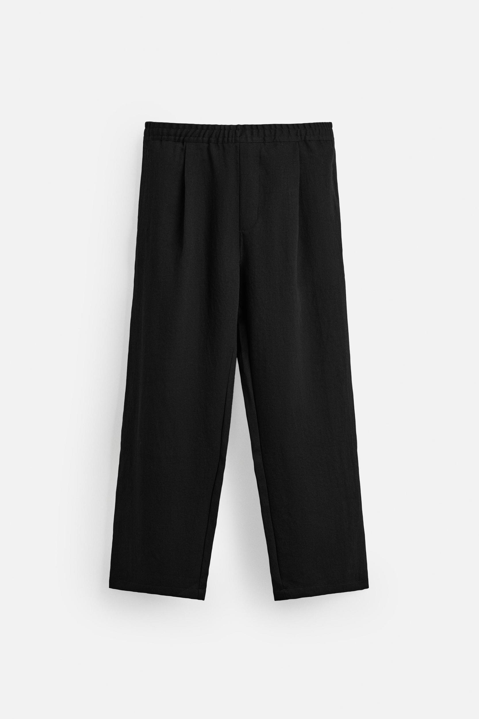 FLOWY PLEATED PANTS Product Image
