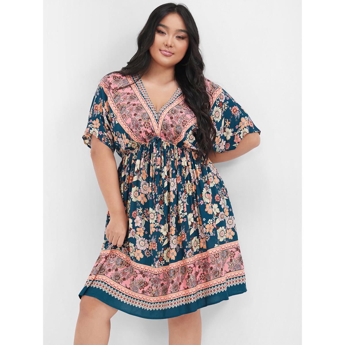 Plus Size Floral V Neck Elastic Waist Pocket Ruffles Knee Dress Indigo Women Vacation Printed V-neck Short sleeve Curvy Knee Dress BloomChic 14-16/1X Product Image