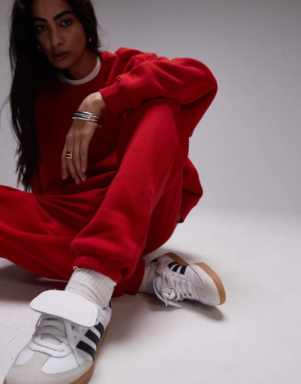 Topshop cuffed sweatpants in red Product Image