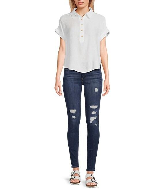 Levi's® 711 Mid Rise 30' Inseam Destructed Skinny Jeans Product Image
