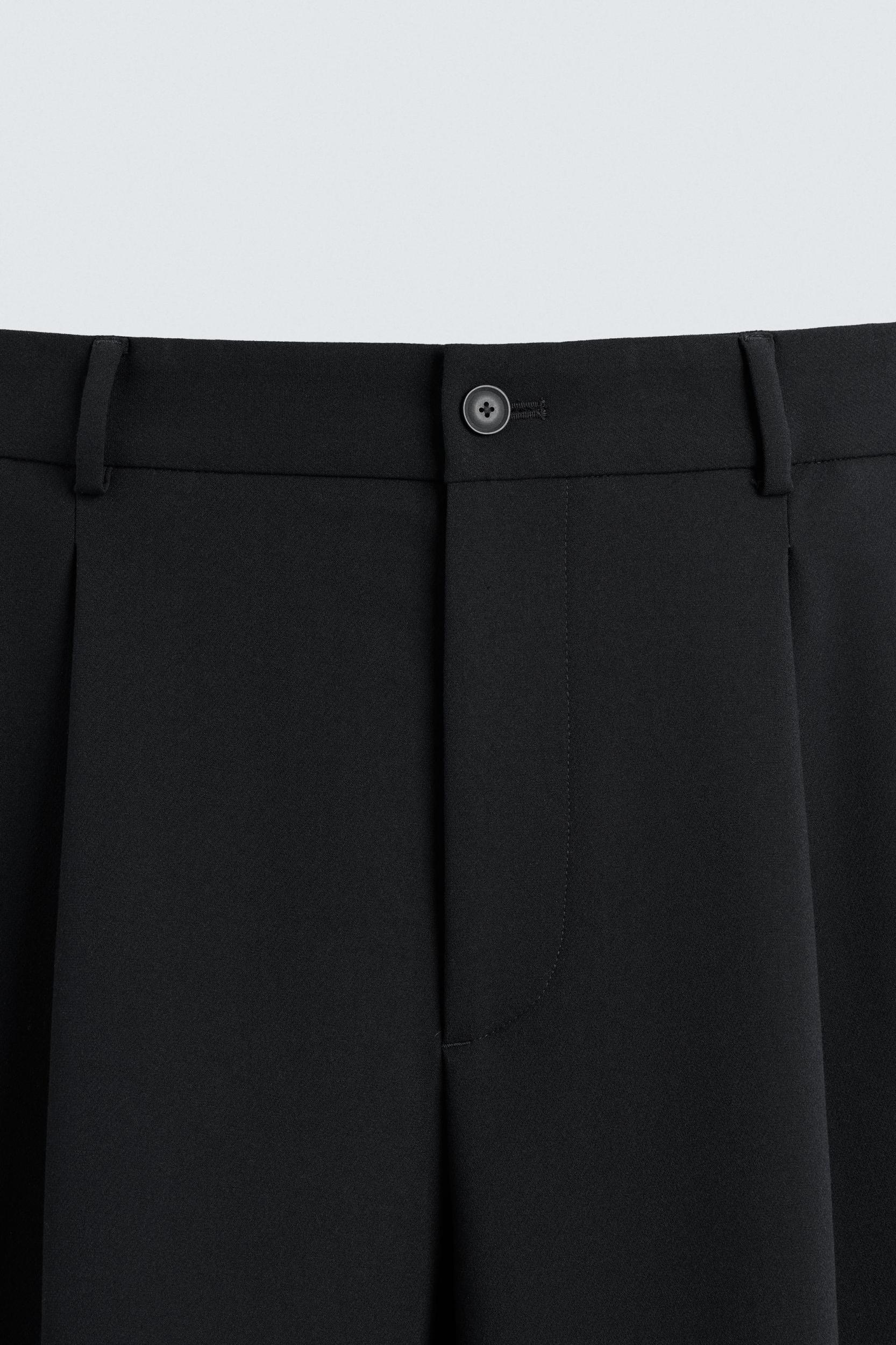 PLEATED RELAXED FIT PANTS Product Image