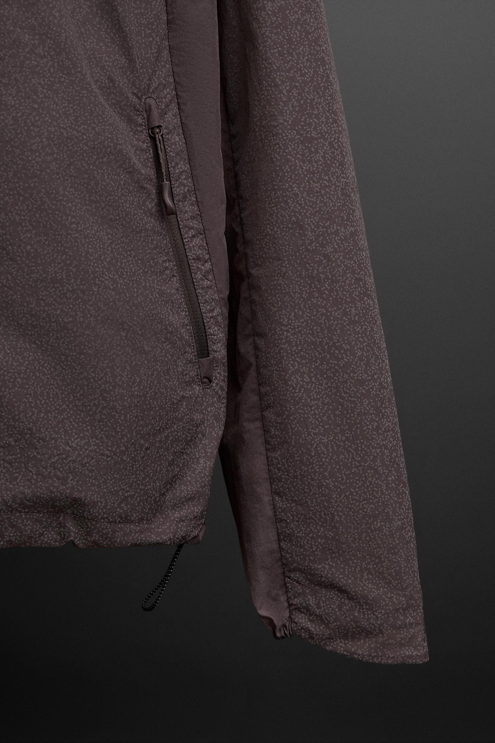 REFLECTIVE WINDBREAKER JACKET Product Image