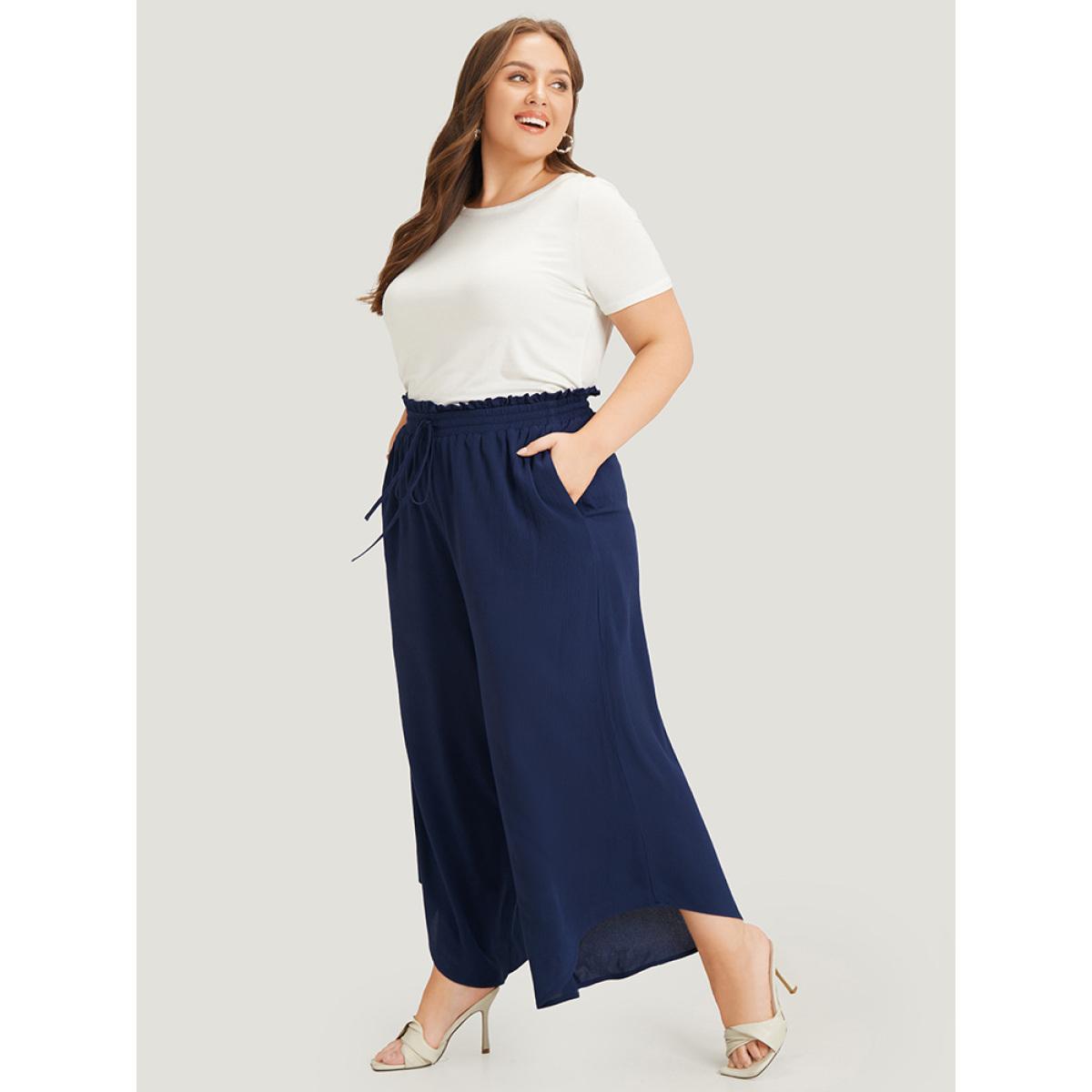 Plus Size Solid Paperbag Waist Asymmetrical Hem Wide Leg Pants Women Indigo Elegant High Rise Dailywear Pants BloomChic 12/L Product Image