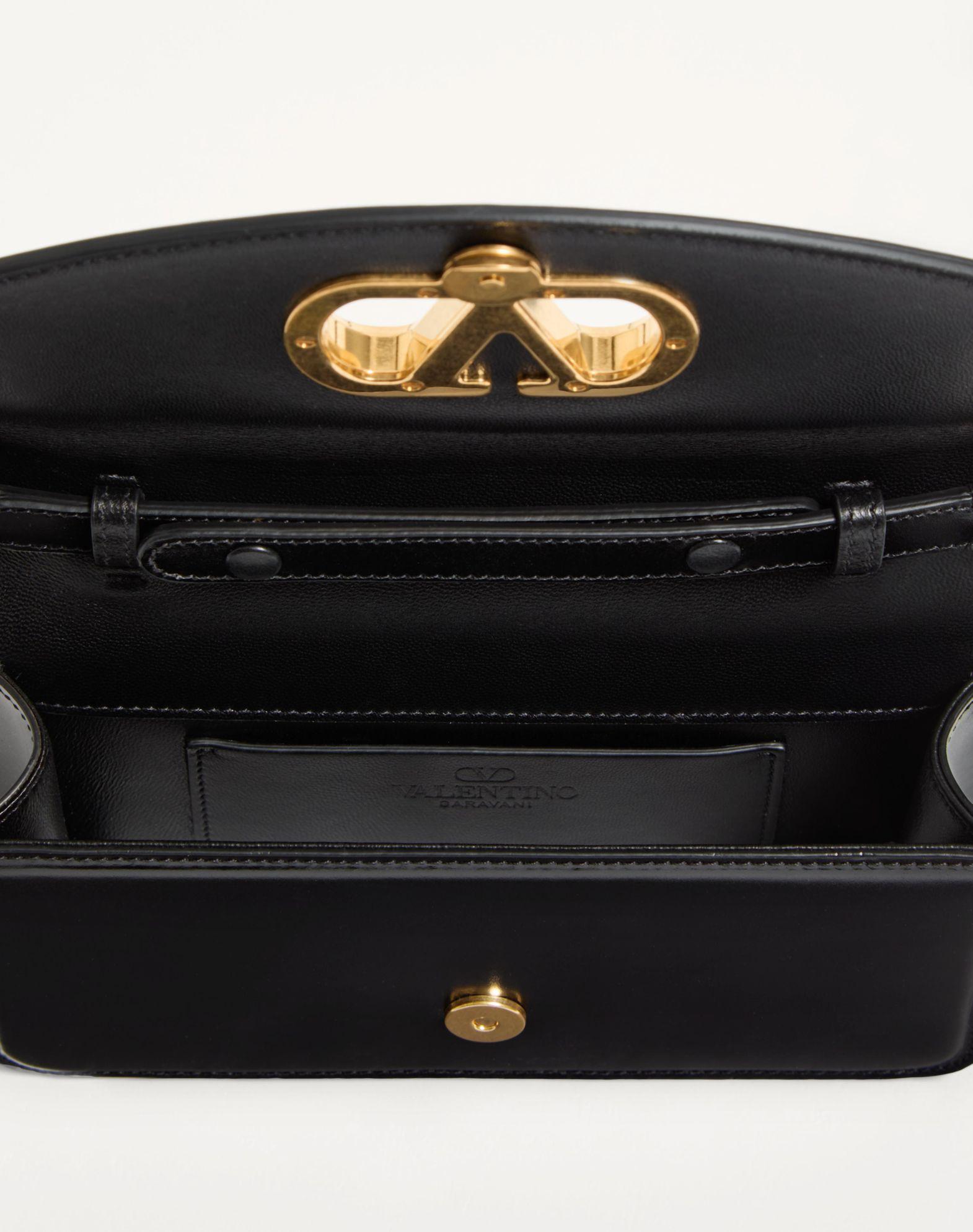 Valentino Garavani Vain Clutch Bag In Shiny Calfskin Product Image