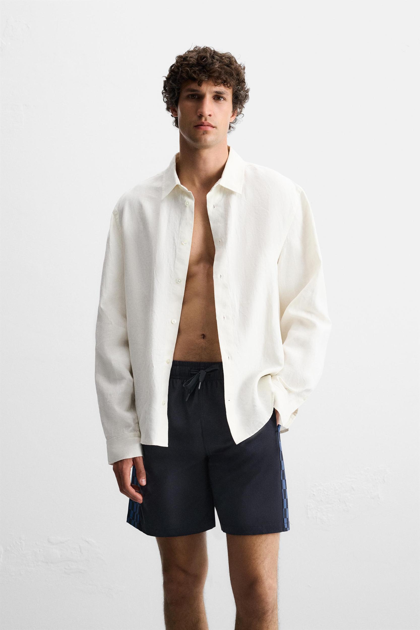 LONG CHECKERED BANDS SWIMSUIT Product Image