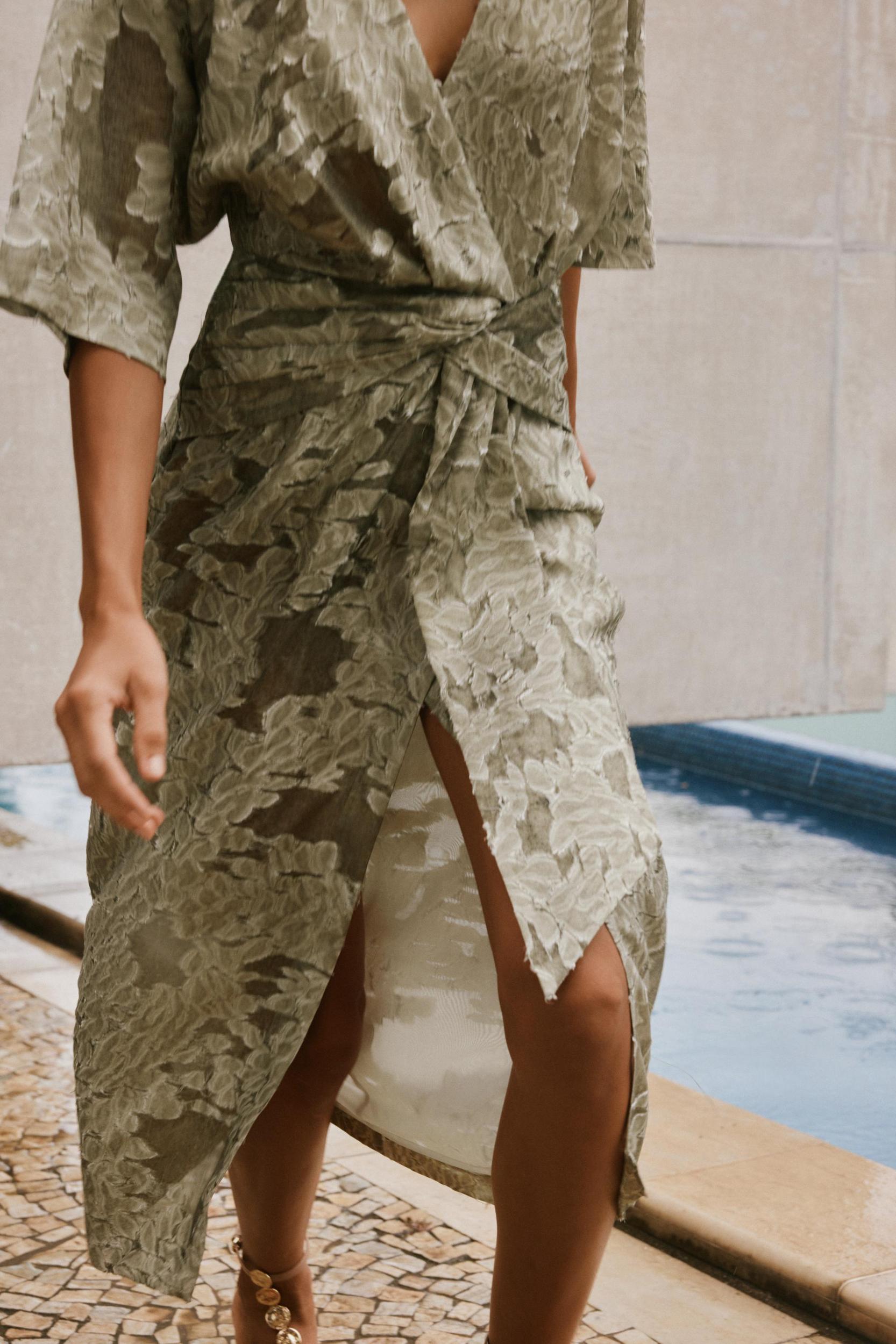 TEXTURED DRAPED DRESS Product Image