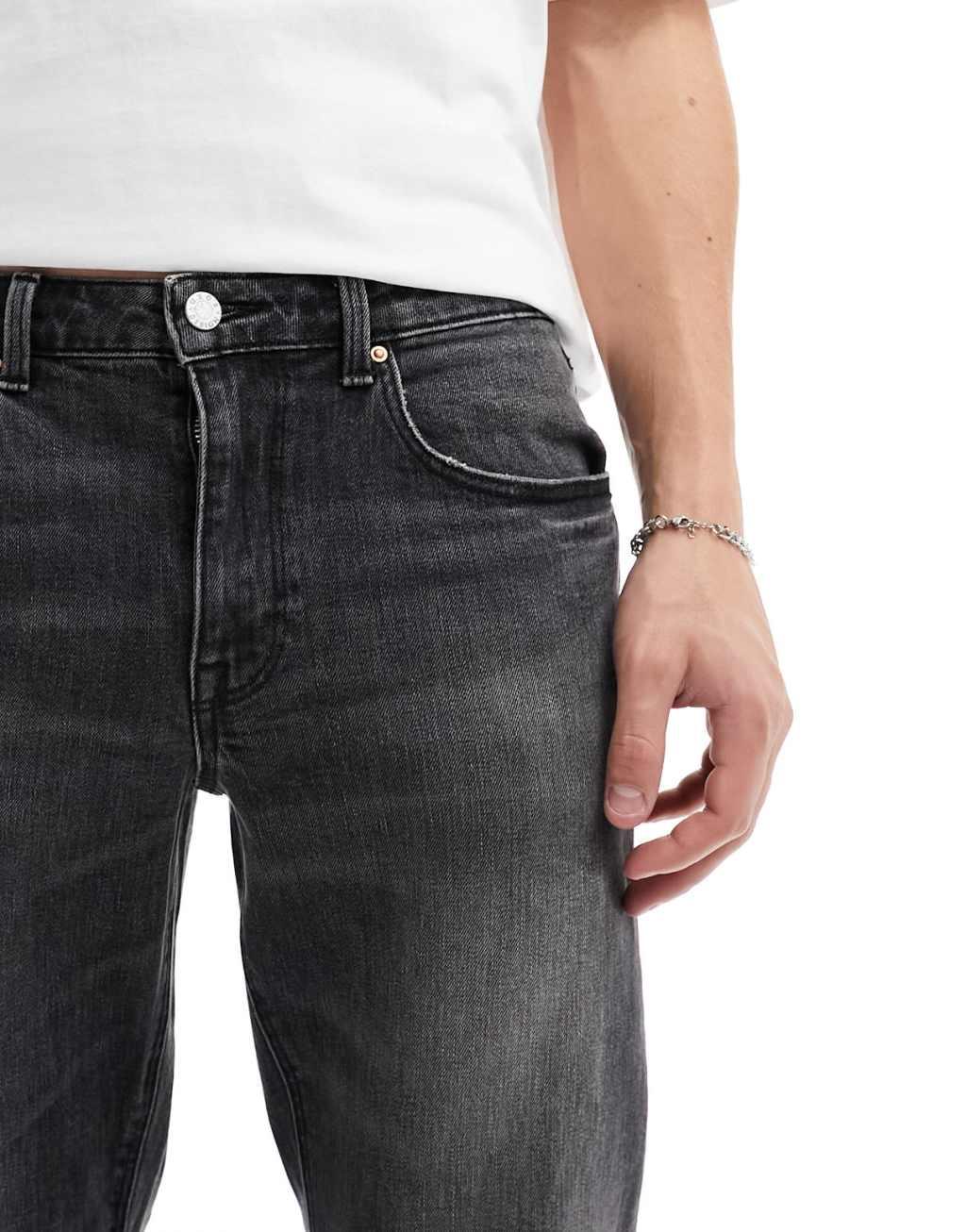 ASOS DESIGN stretch tapered jeans in washed black Product Image