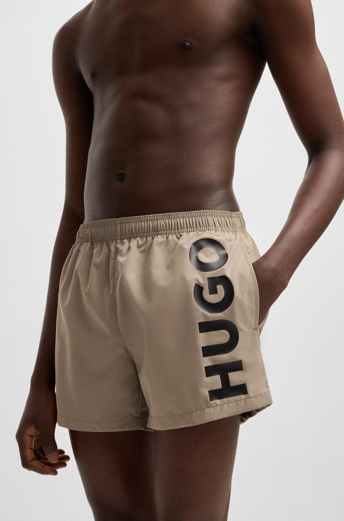 HUGO - Quick-dry swim shorts with vertical logo print - Light Blue Product Image