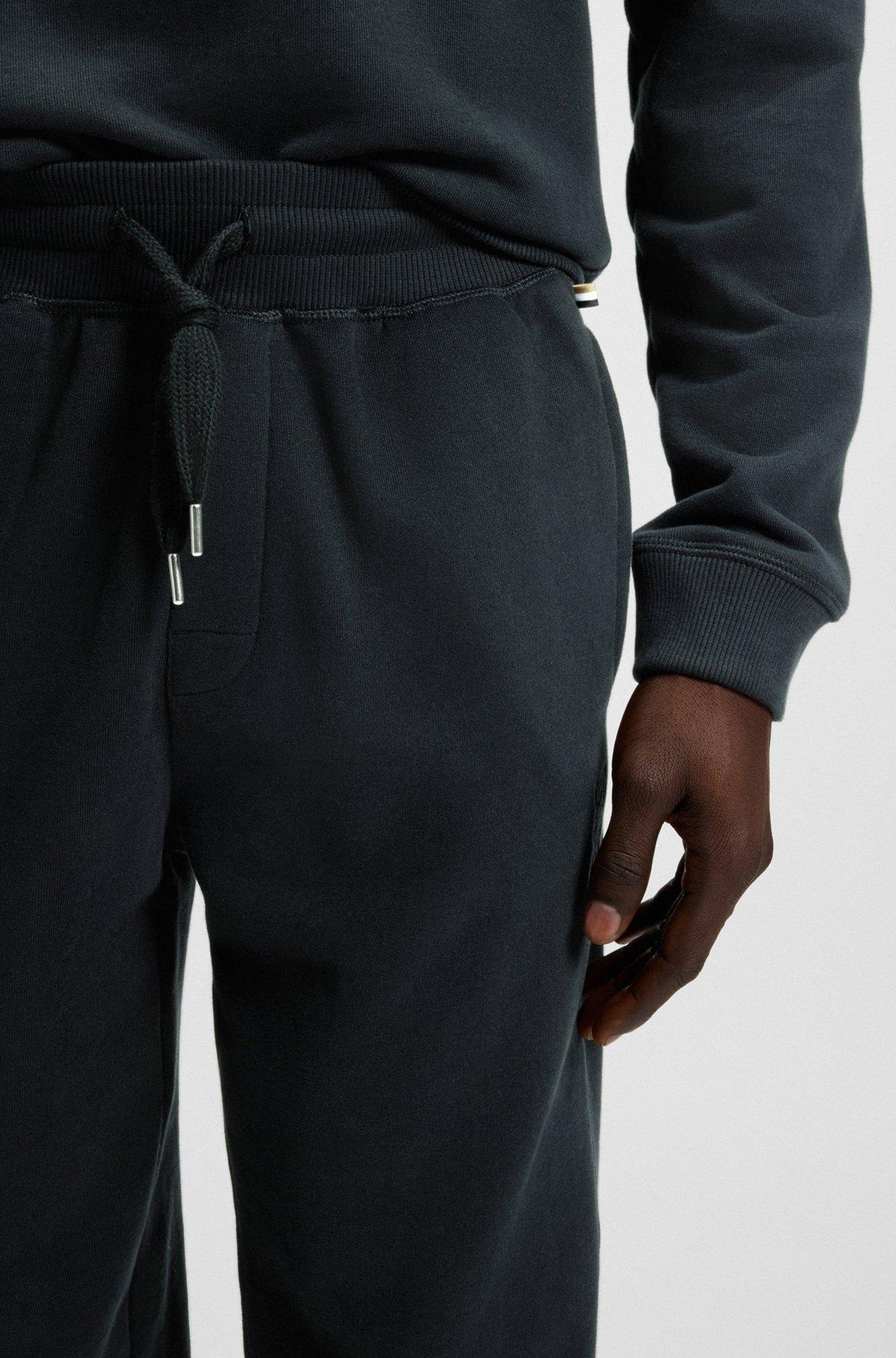 Cotton-terry tracksuit bottoms with embroidered logo Product Image