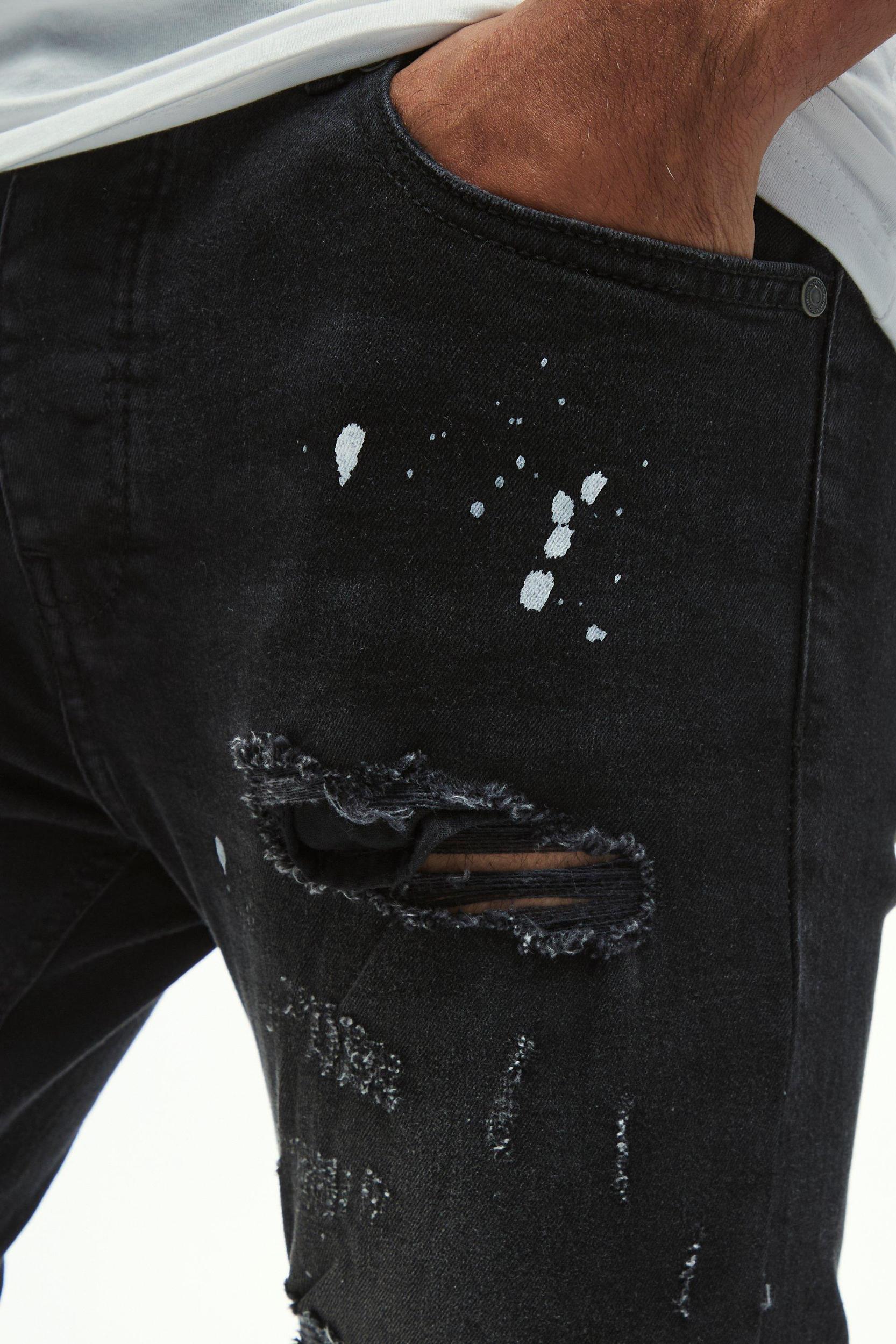 Skinny Stretch All Over Rip & Repair Paint Splatter Jeans | boohooMAN USA Product Image