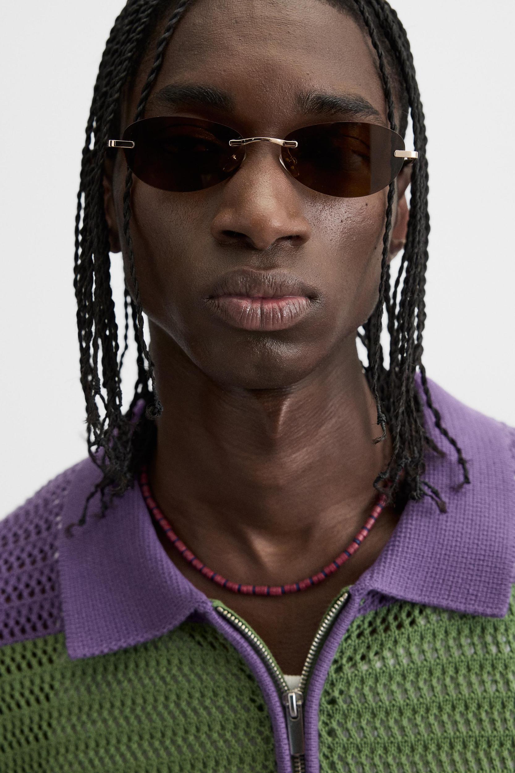 TEXTURED STRIPED KNIT POLO Product Image