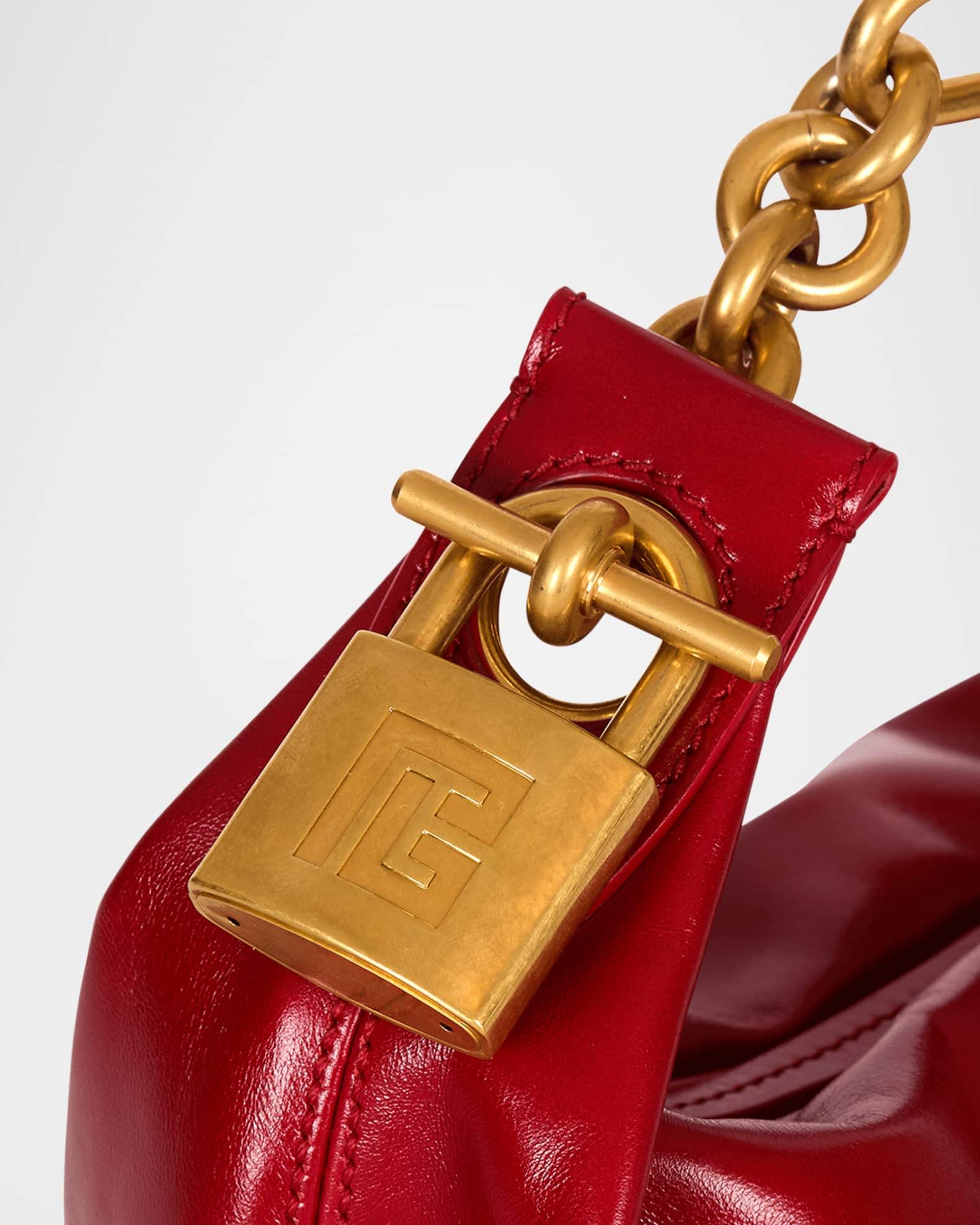 Sync Chain Mini Top-Handle Bag in Calfskin Leather Product Image