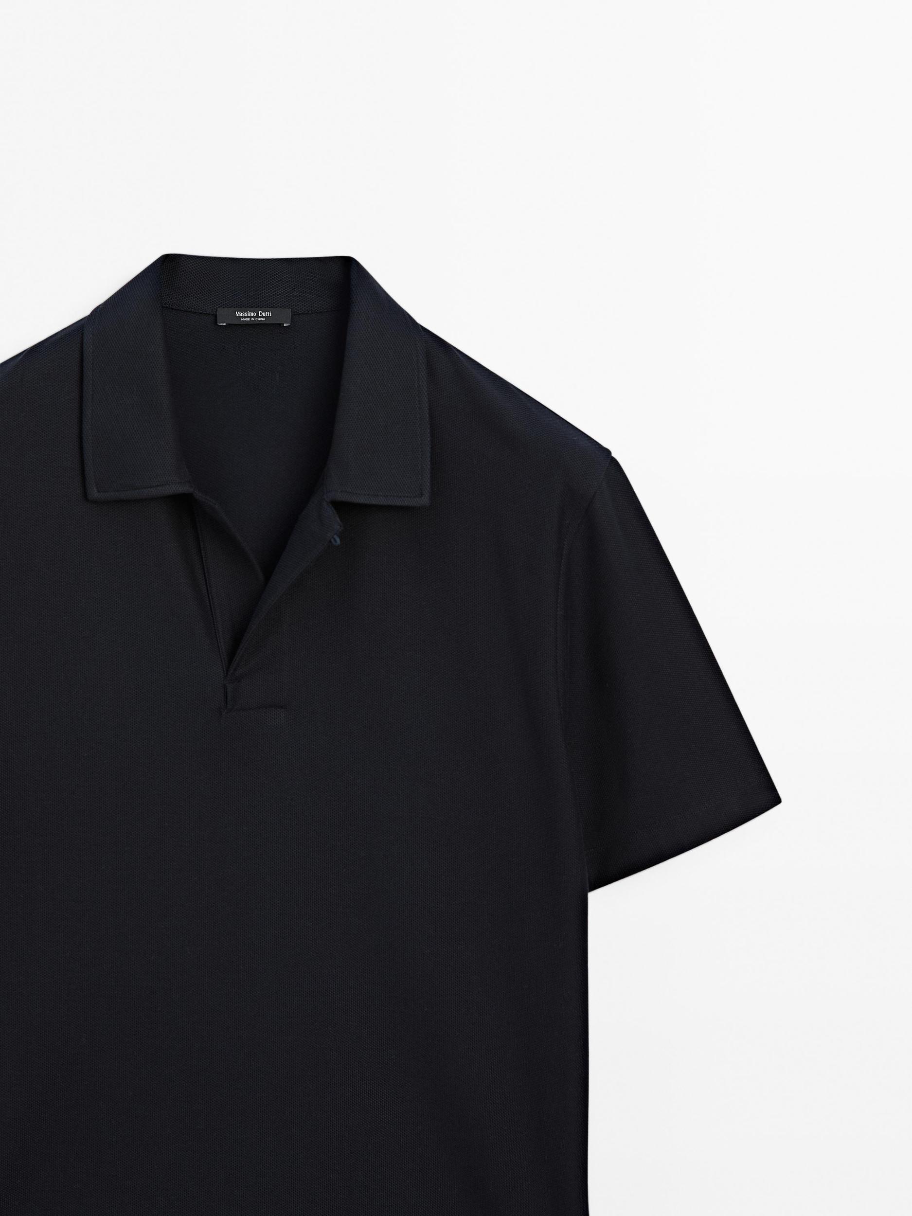 Textured polo shirt with hidden button Product Image