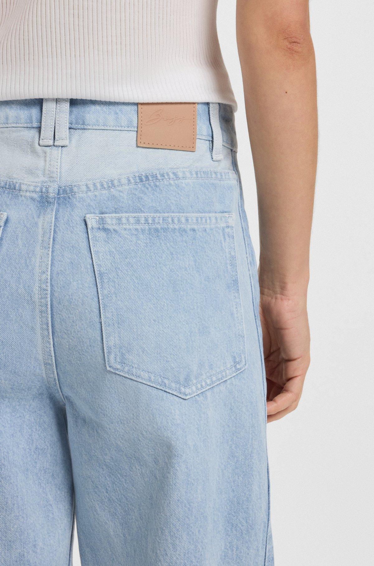 Wide-leg jeans in blue rigid denim with paneling Product Image