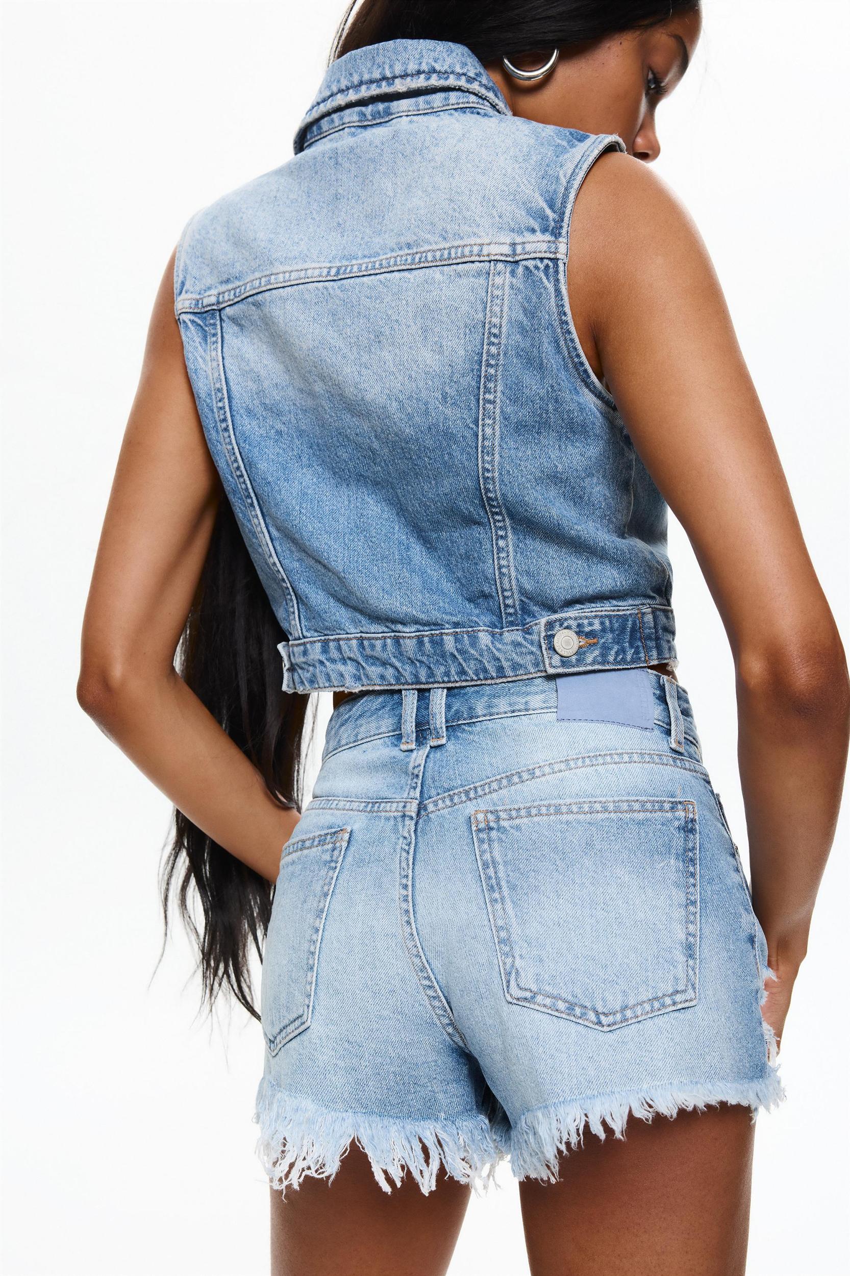 Ripped hem denim shorts Product Image