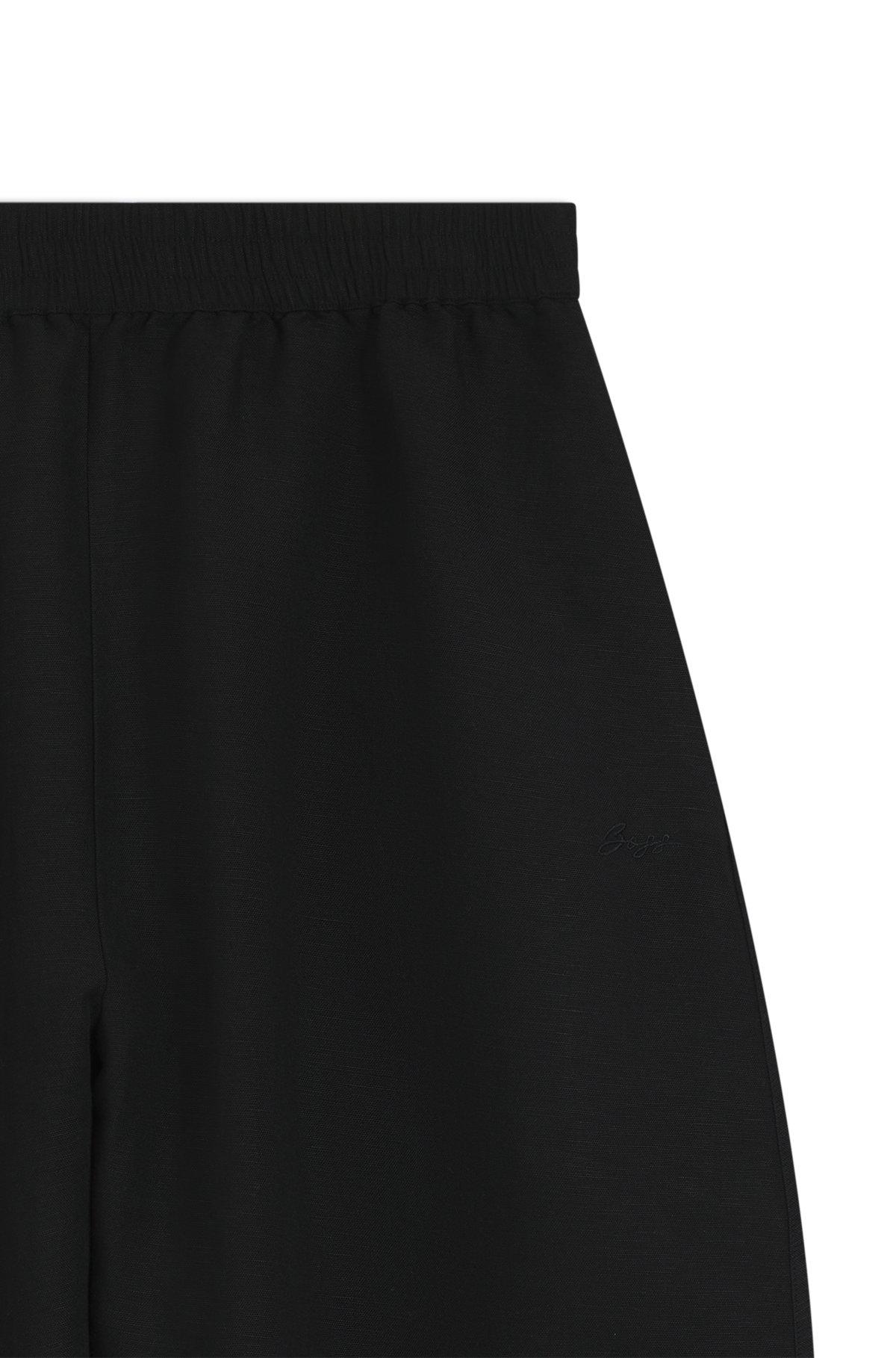 Balloon-leg trousers with elasticated waist Product Image