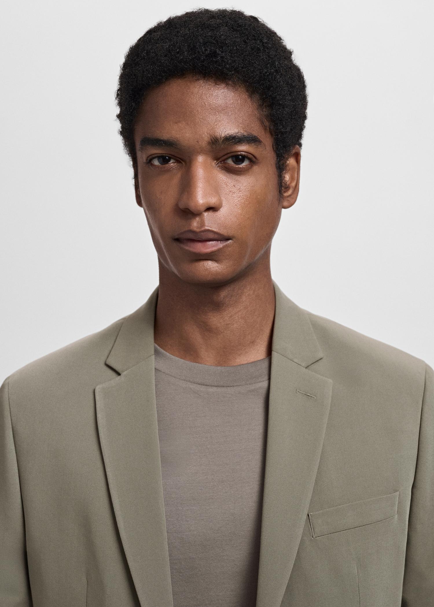 Super slim-fit suit jacket in stretch fabric - Men | MANGO USA Product Image