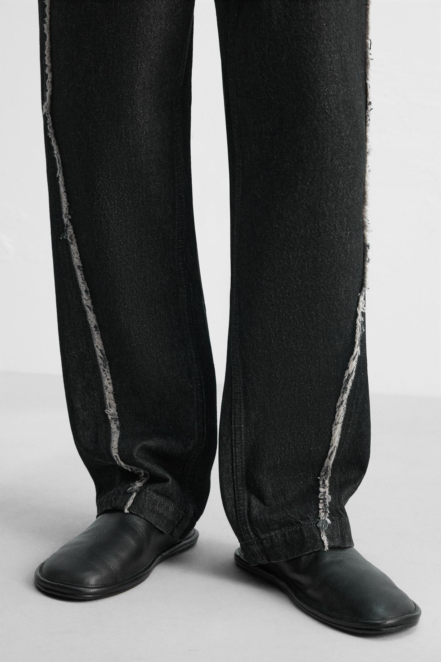 RELAXED FIT FRAYED SEAM JEANS Product Image