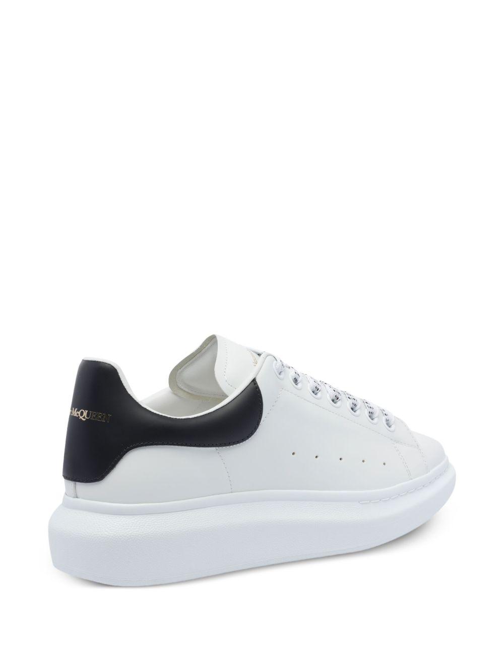 Oversized leather lace-up sneakers Product Image