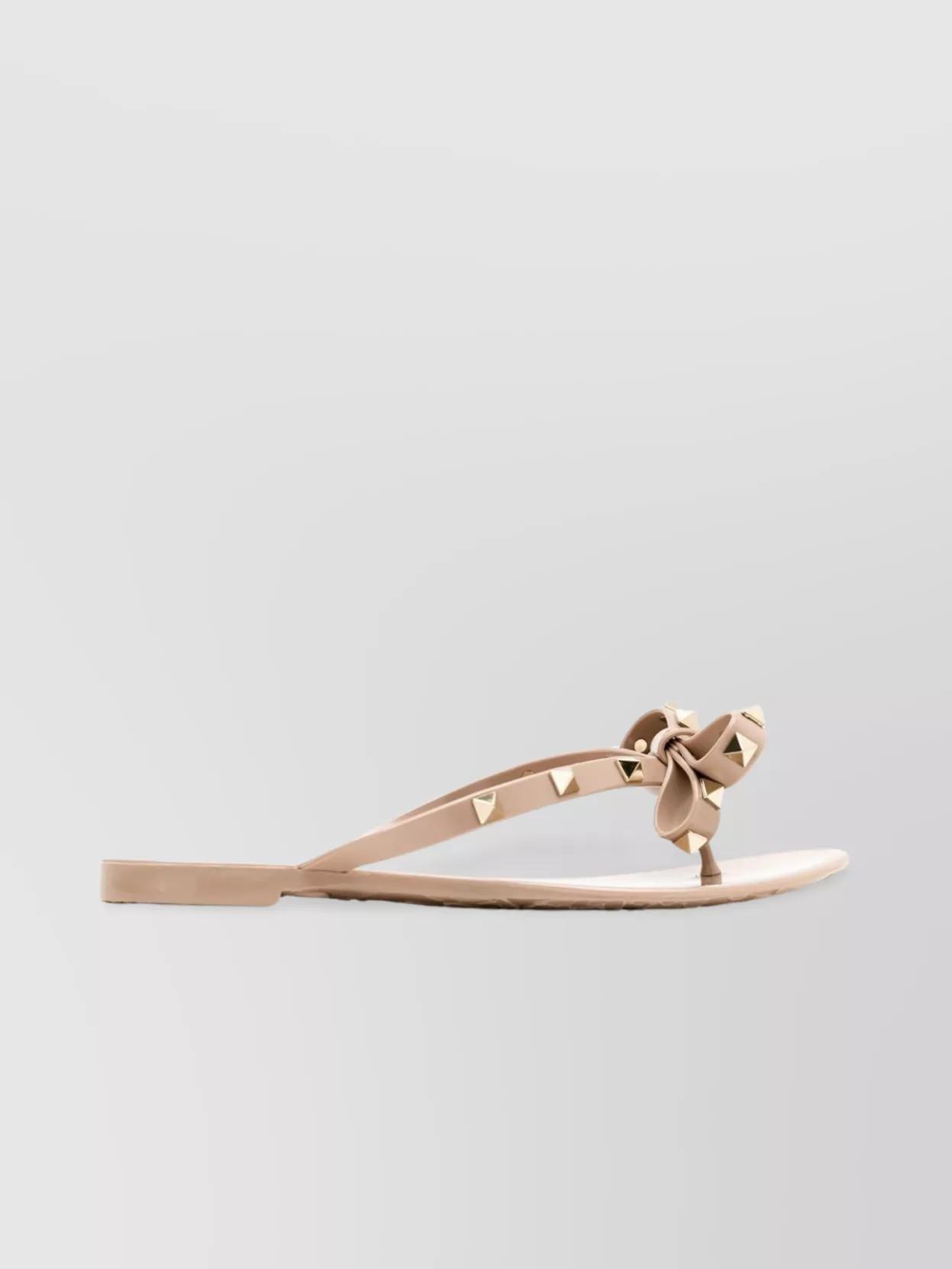 VALENTINO GARAVANI Women Rockstud Rubber Flip Flops In Beige Product Image