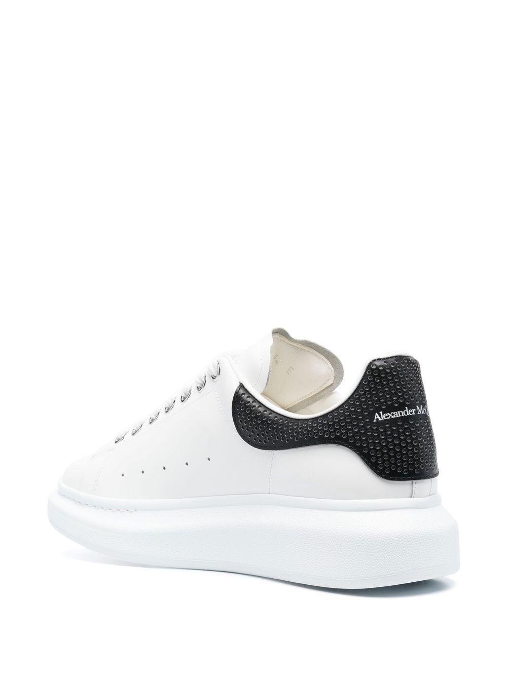 Oversized low-top leather sneakers Product Image
