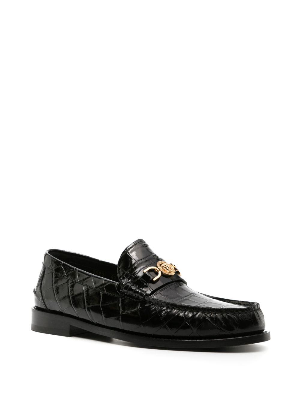 Medusa crocodile-embossed leather loafers Product Image