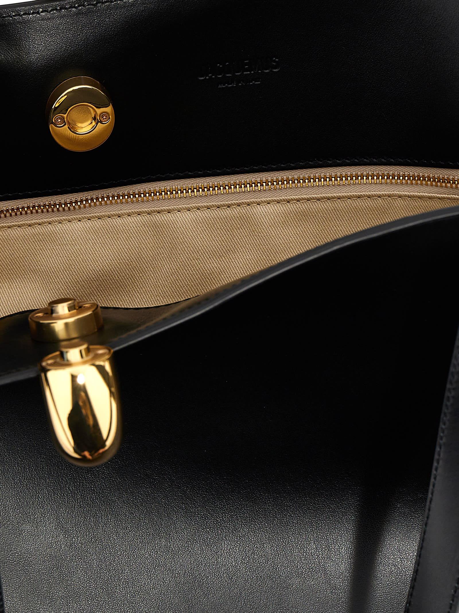 JACQUEMUS The Medium Bambola Asymmetric Leather Bucket Bag In Black 990 Product Image