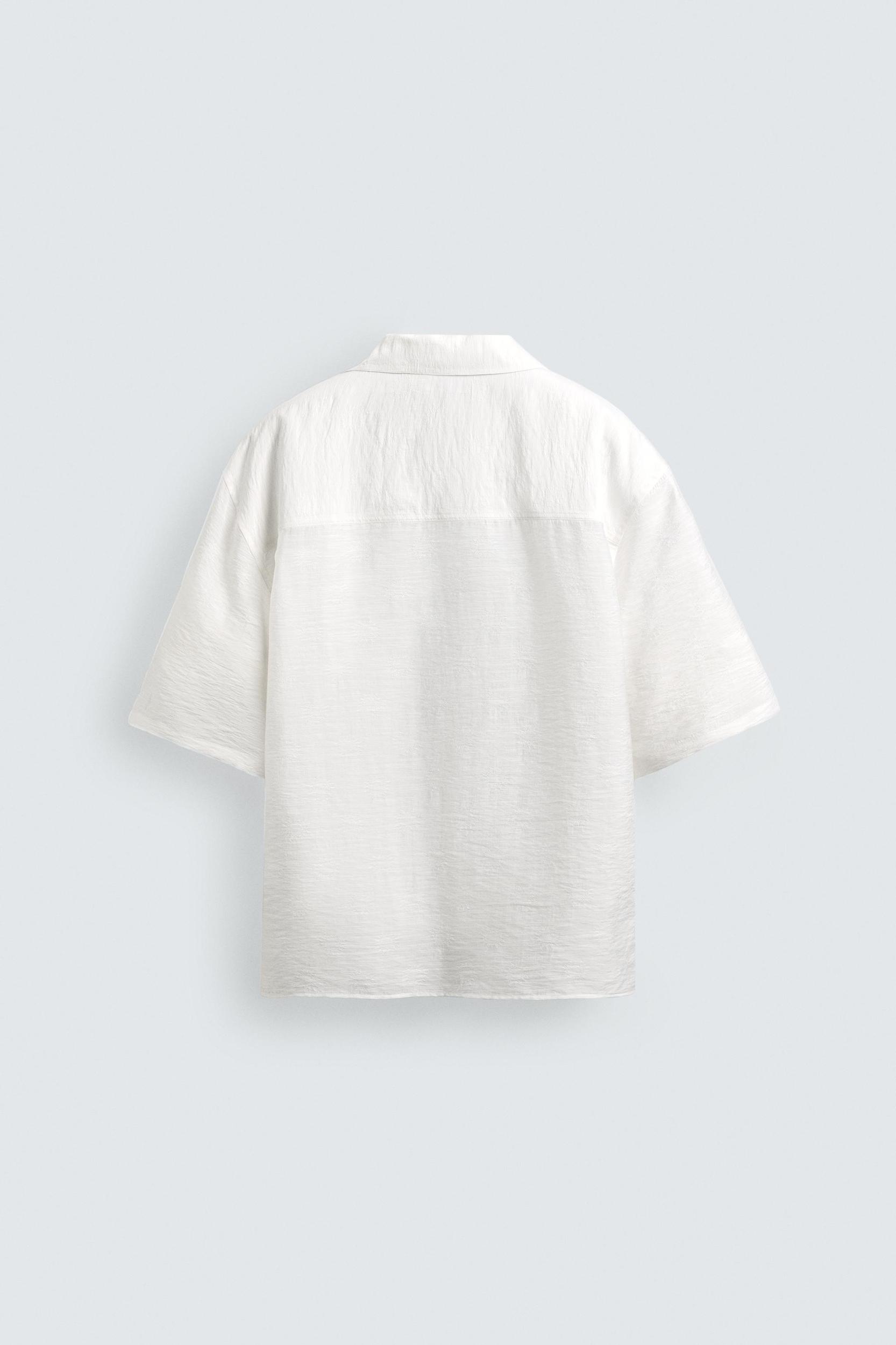 FLOWY JACQUARD POLO SHIRT Product Image