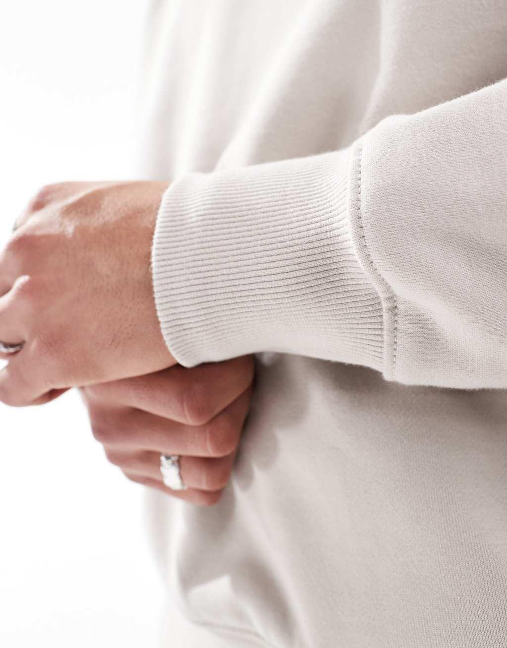 ASOS DESIGN premium heavyweight oversized sweatshirt in light beige Product Image