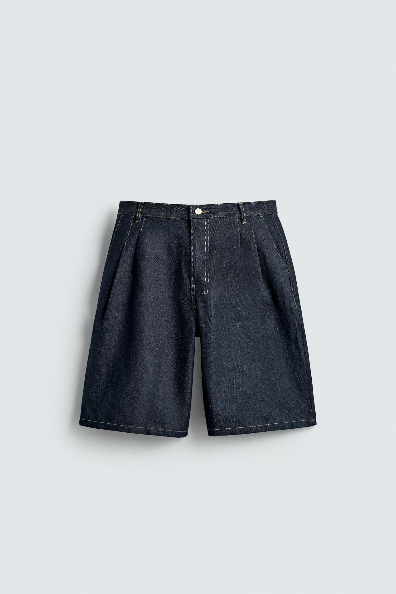 RELAXED FIT PLEATED DENIM SHORTS Product Image