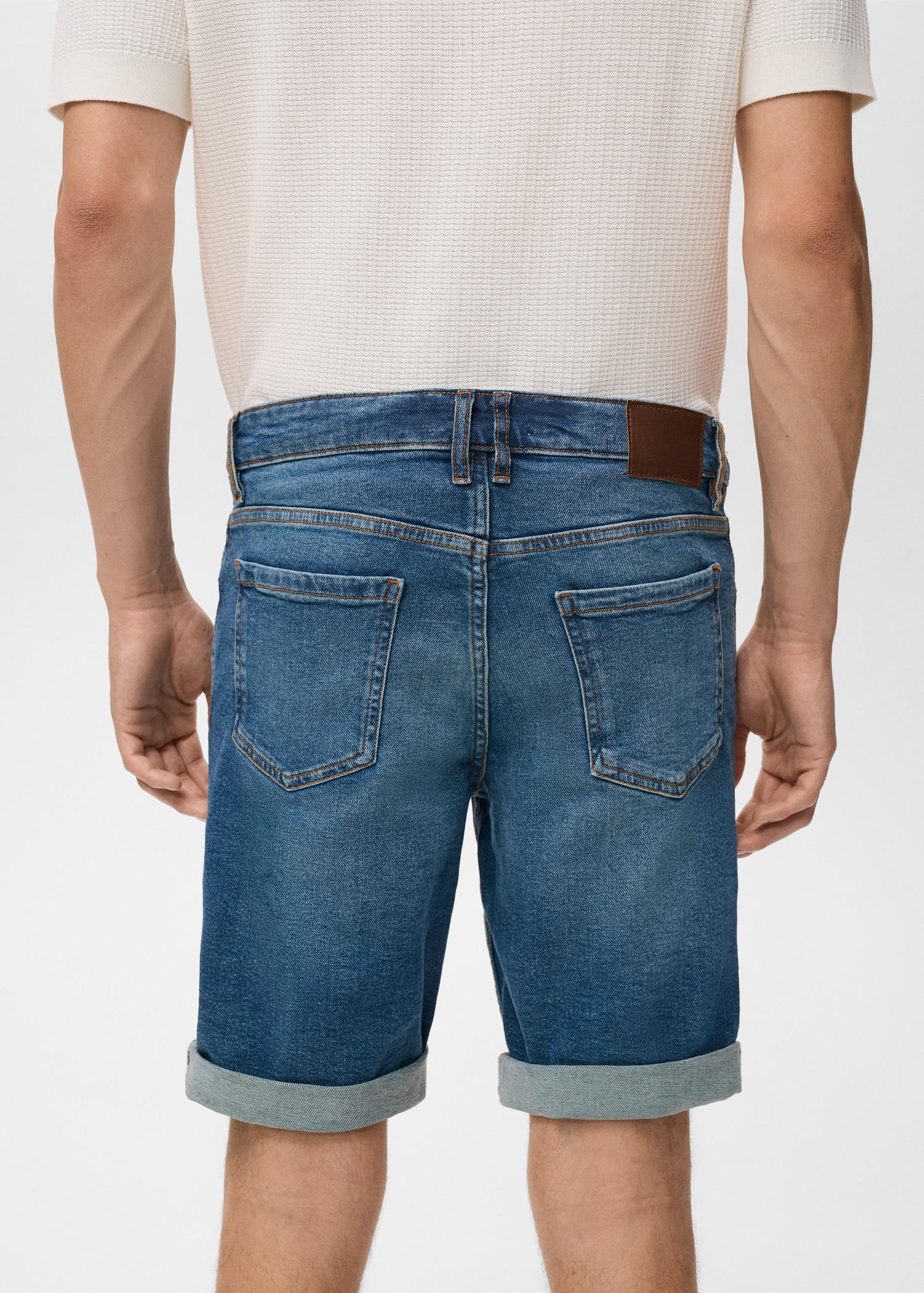 Slim-fit denim bermuda shorts - Men | MANGO USA Product Image