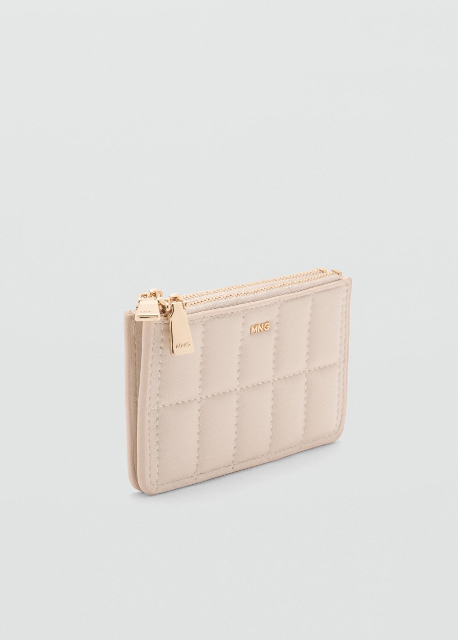 Quilted purse with double pocket - Women | MANGO USA Product Image