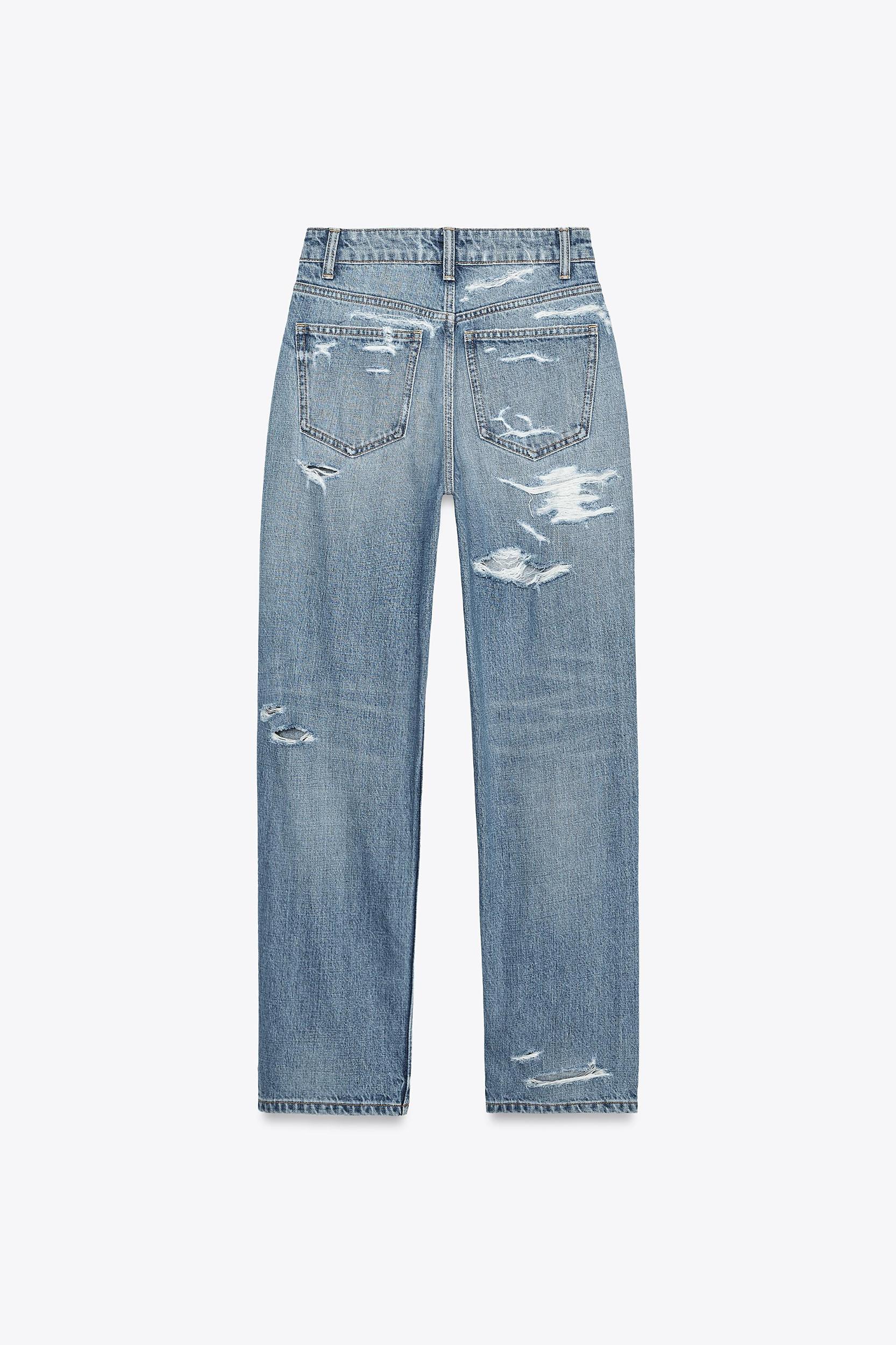 HI-RISE RIPPED MOM FIT JEANS Product Image
