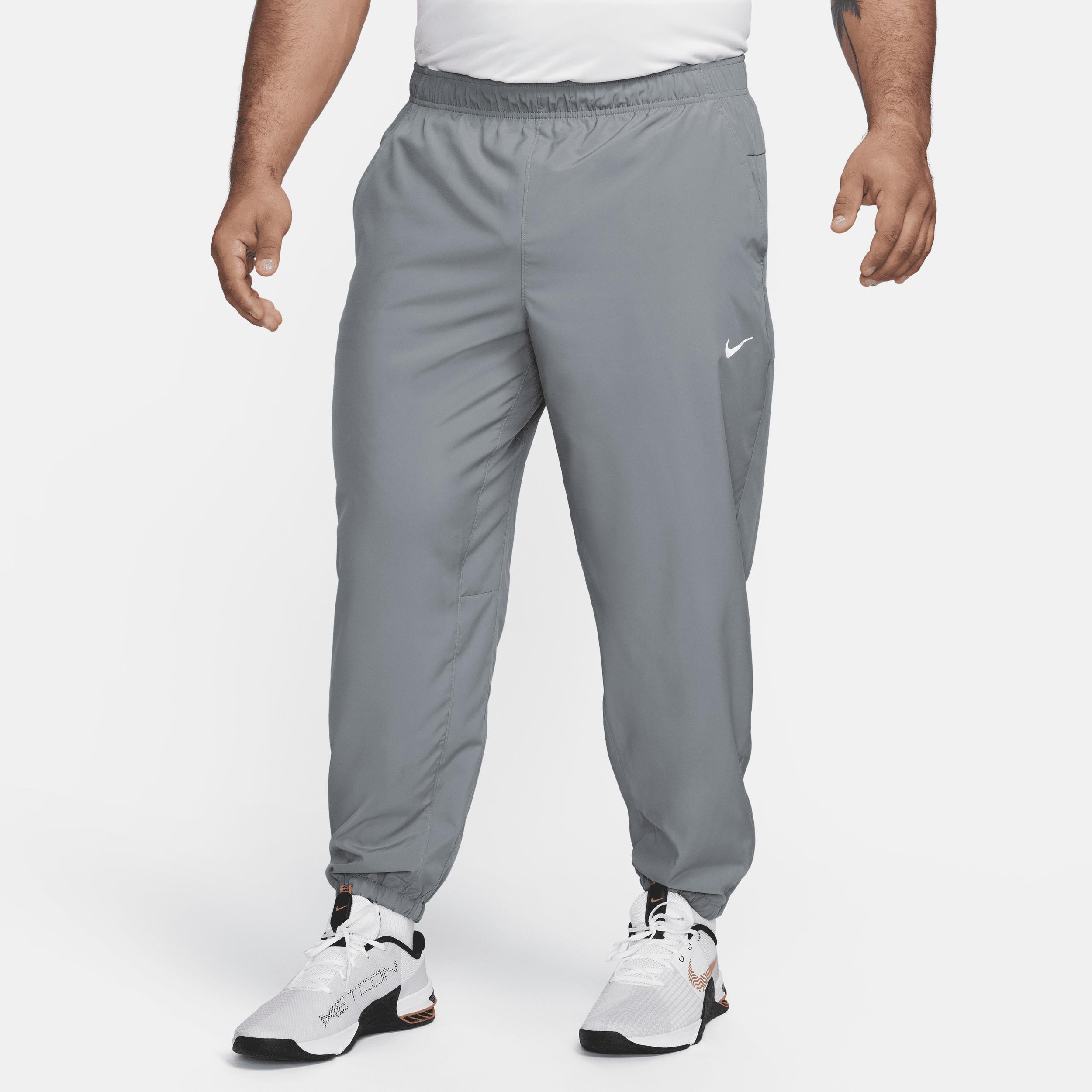 Nike Mens Form Dri-FIT Tapered Versatile Pants | FB7497-084 Product Image