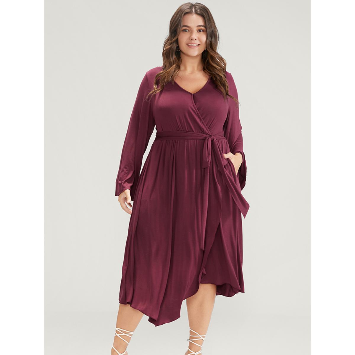 Plus Size Solid Wrap Knotted Front Pocket Bell Sleeve Asymmetrical Hem Dress Burgundy Women Elegant Wrap V-neck Long Sleeve Curvy Midi Dress BloomChic 14-16/1X Product Image