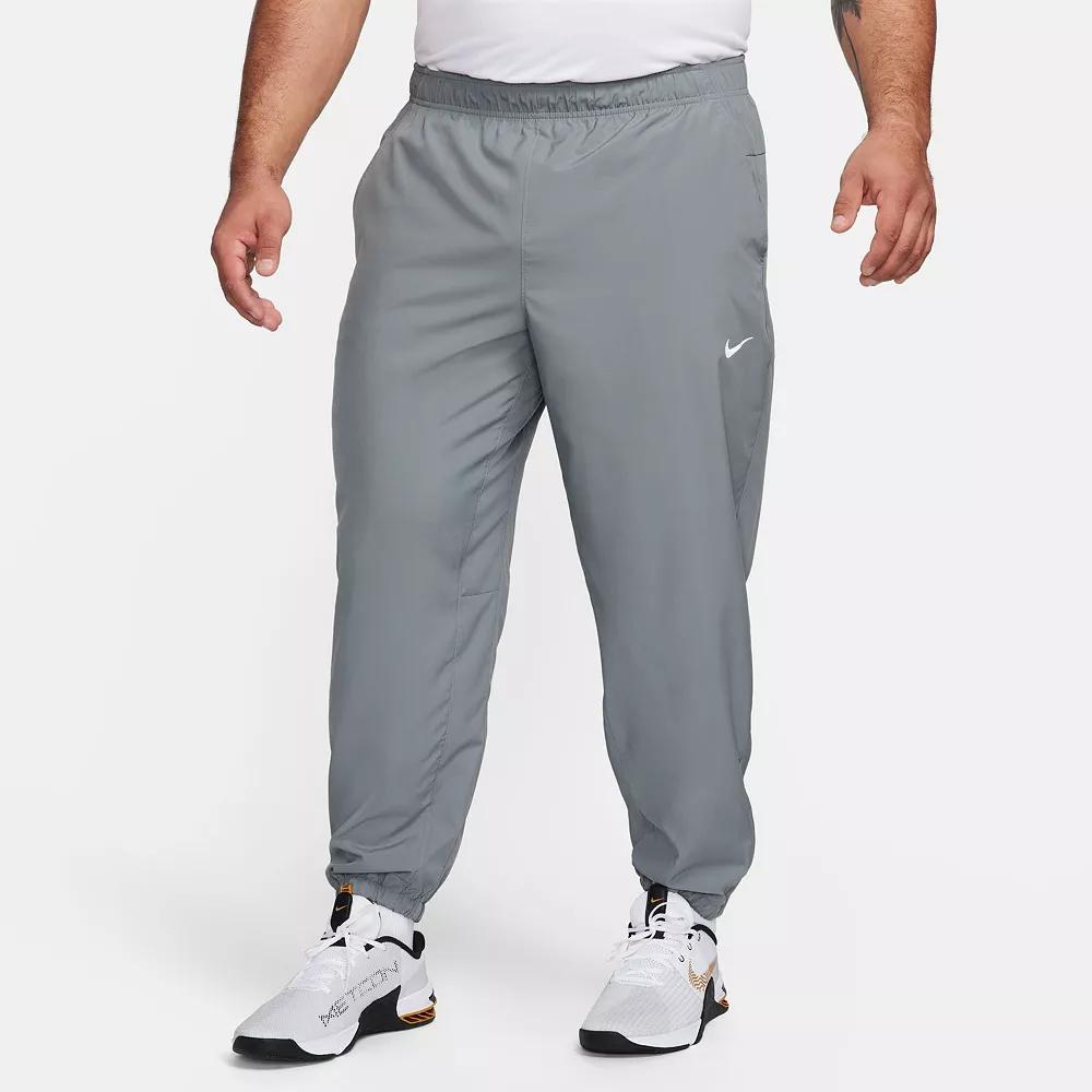 Nike Mens Form Dri-FIT Tapered Versatile Pants | FB7497-084 Product Image