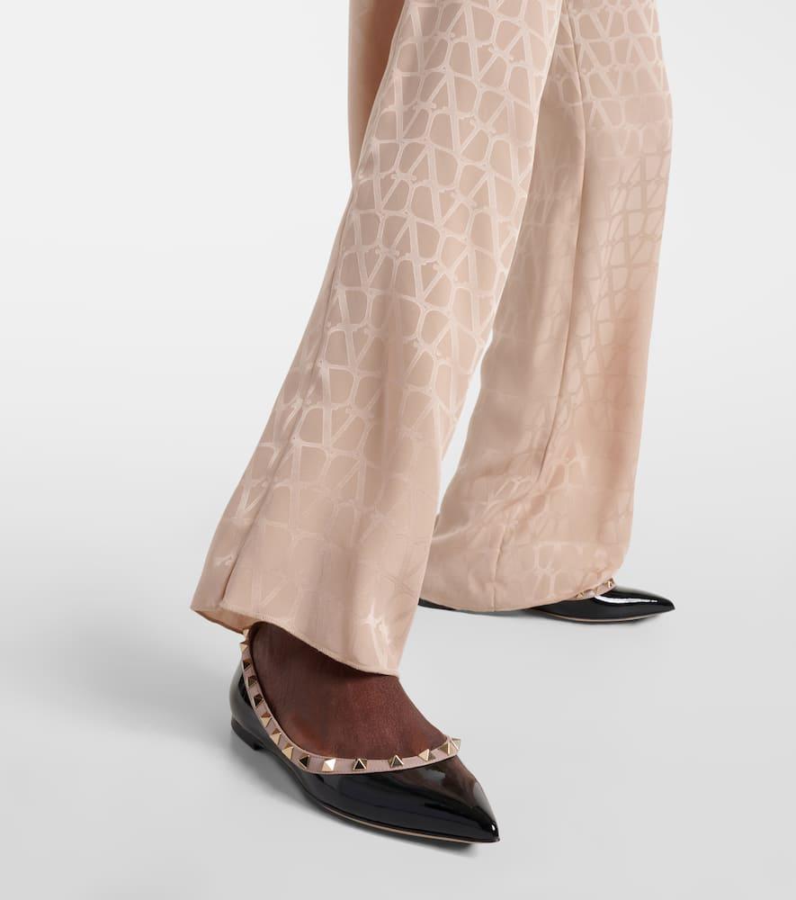 VALENTINO GARAVANI Pointed Toe Studded Trim Flat Sole Ballerina In Black Product Image