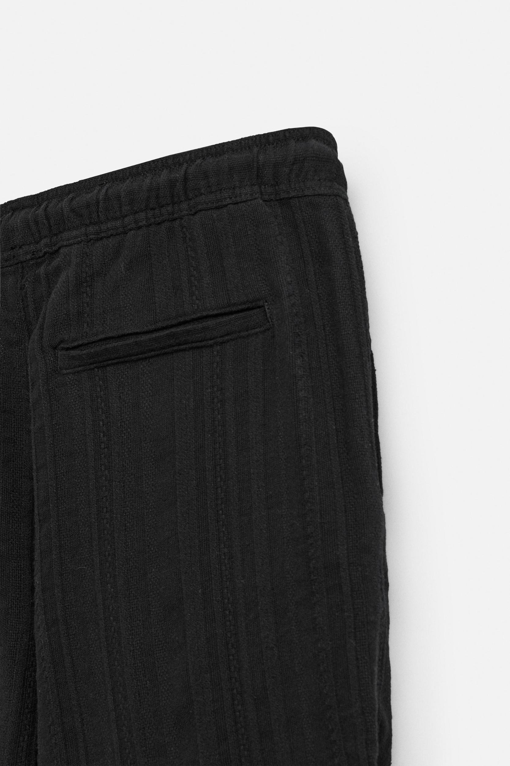 TEXTURED RELAXED FIT PANTS Product Image