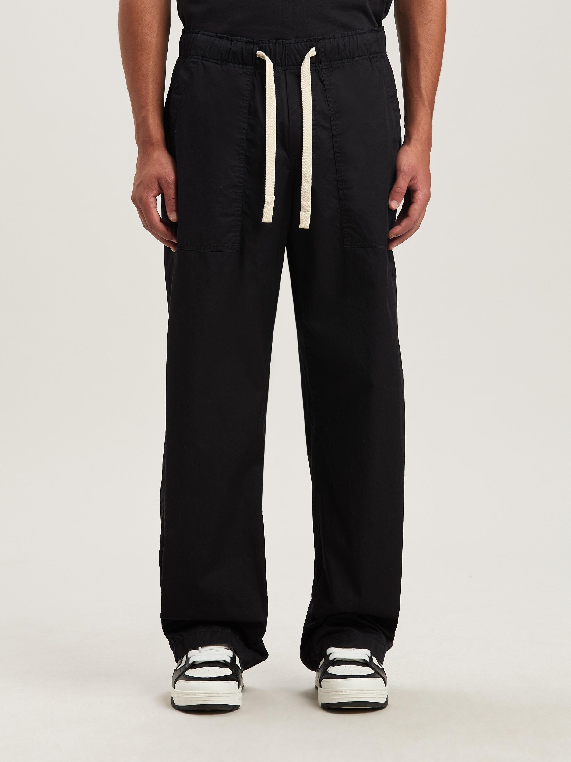 CURVED LOGO LOOSE PANTS Product Image