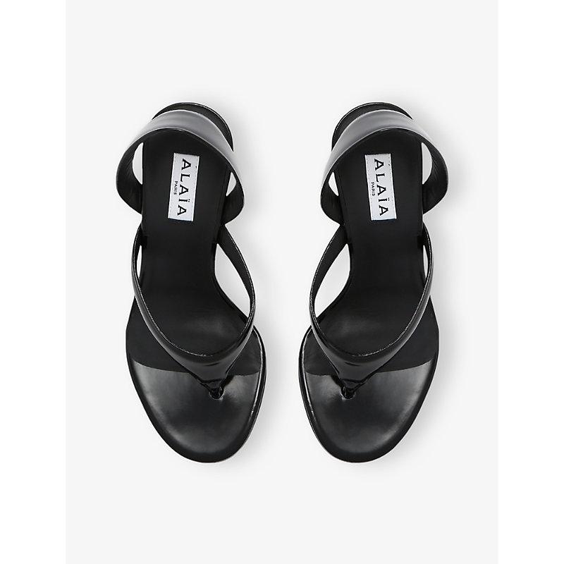 ALAÏA Leather Thong Slingback Sandals In Noir Product Image