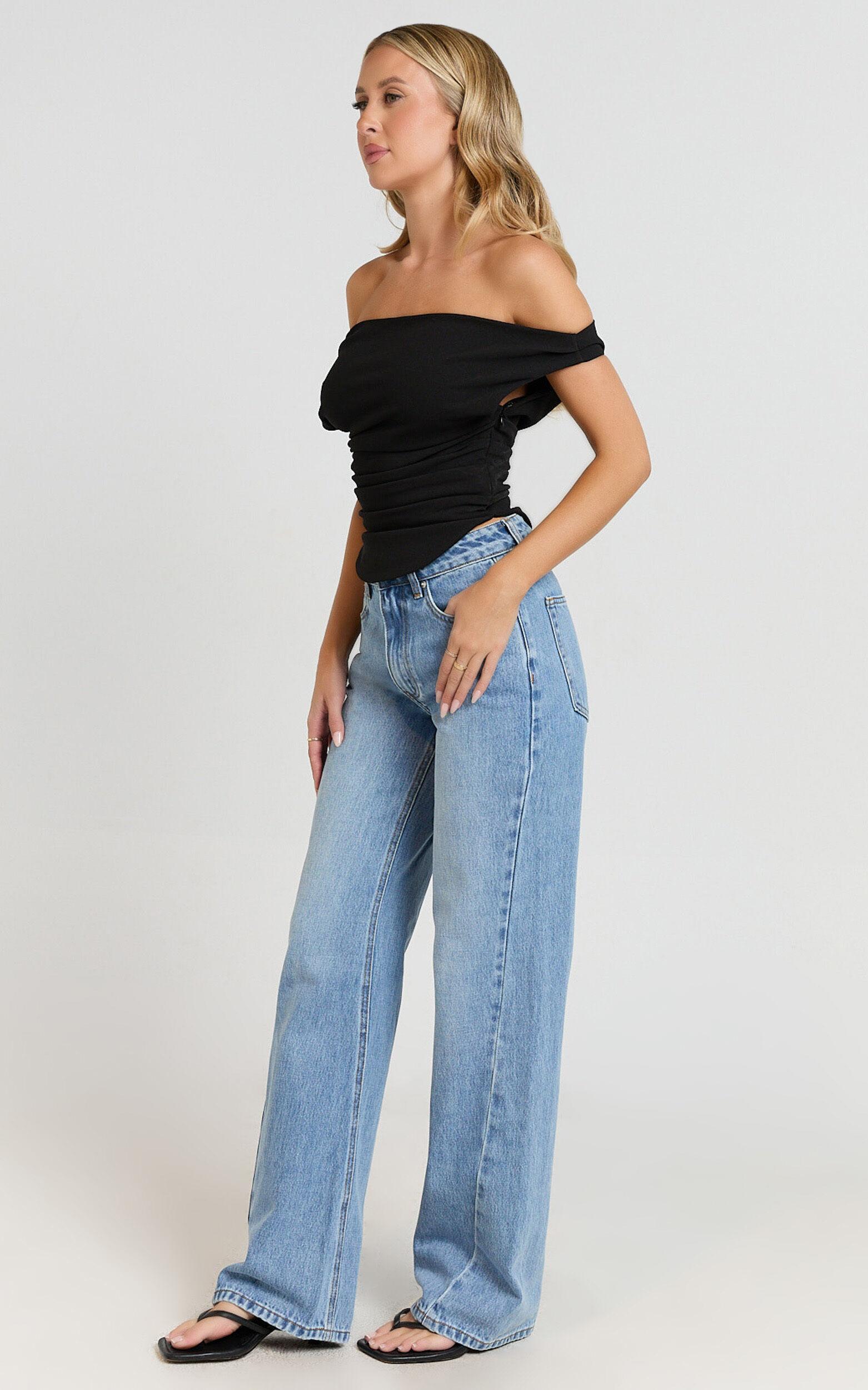 Cleo Top - Off Shoulder Curved Hem Top in Black Product Image
