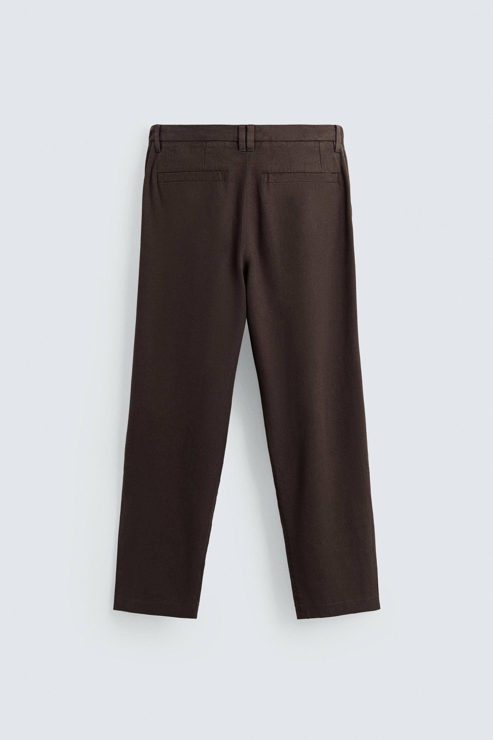FLOWY PLEATED PANTS Product Image