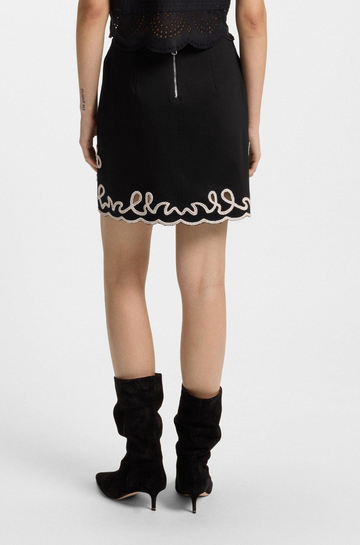 Cotton mini skirt with contrast embroidery Product Image