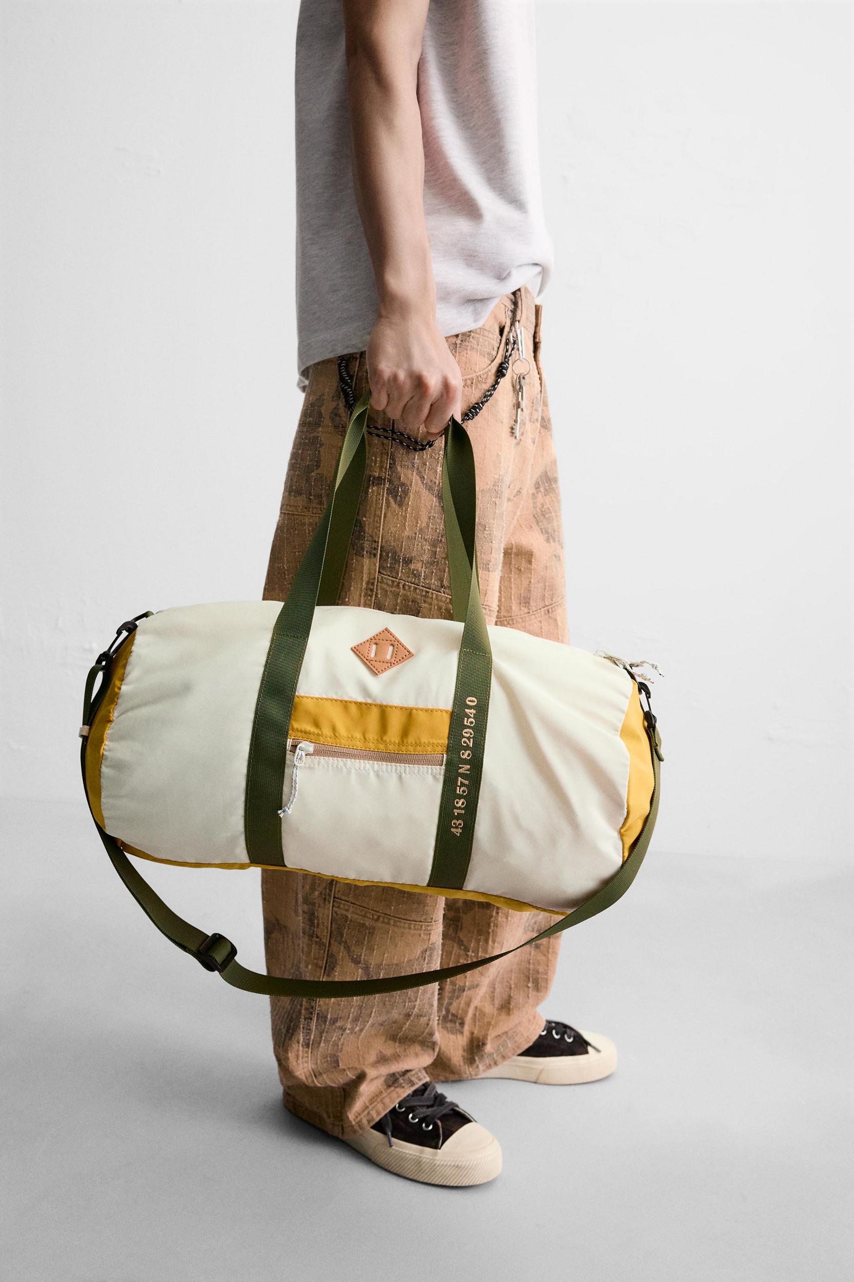CONTRAST TRAVEL BAG Product Image