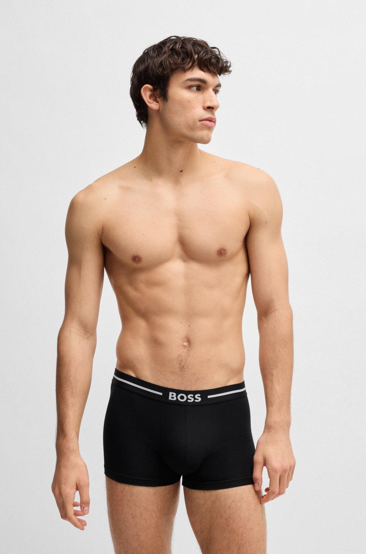 Three-pack of stretch-cotton plain and monogrammed trunks  Product Image