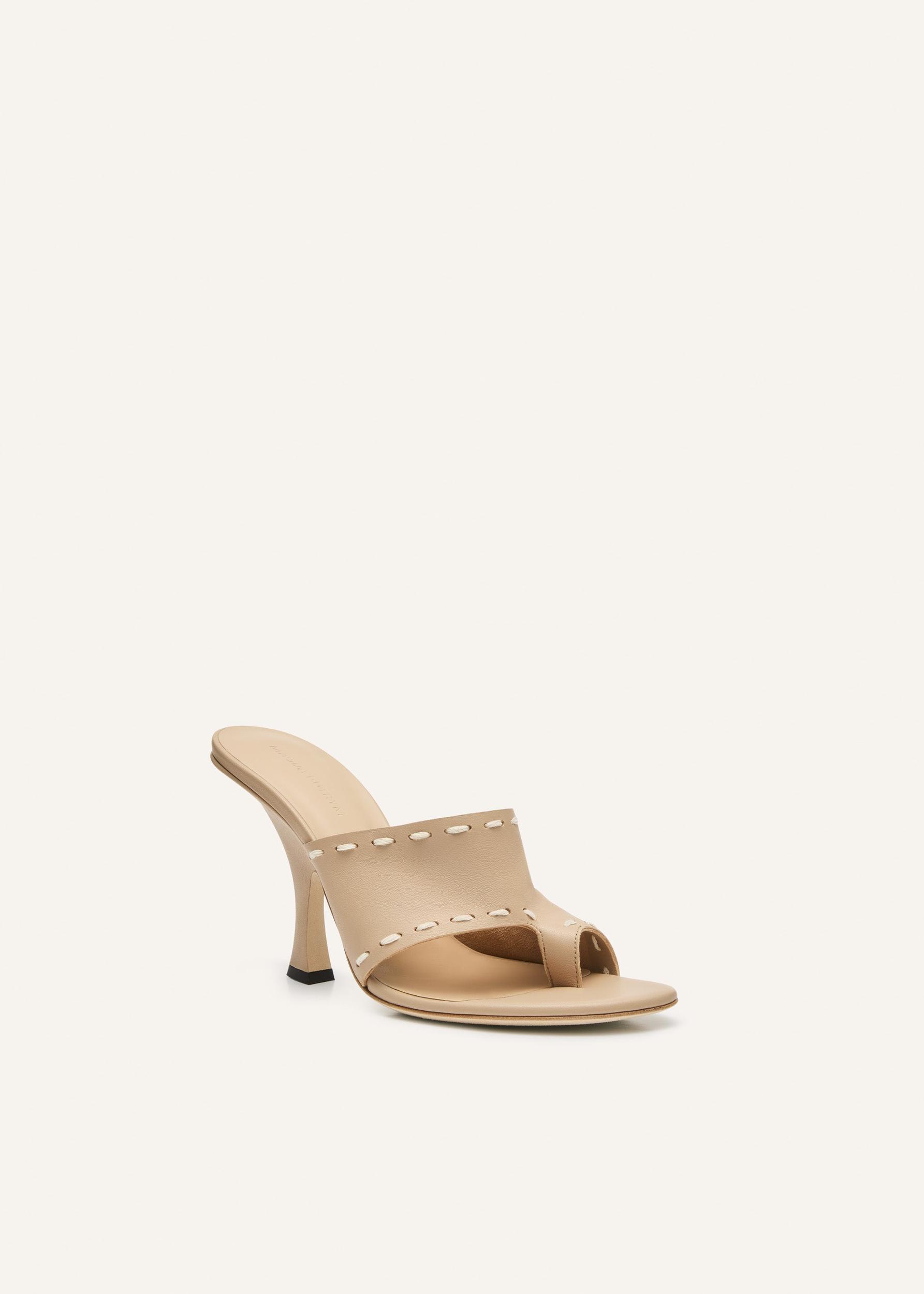 Flare heel thong sandals in nude leather Product Image